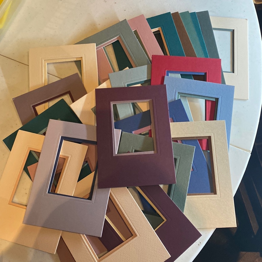25 double matting 5x7 outside/ 2 3/4 x 3 1/2 inside multi. Colors